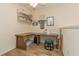 Small office space with a desk and shelving at 440 Palmetto Ct # 3, Venice, FL 34285
