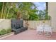 Patio with fountain and seating area at 440 Palmetto Ct # 3, Venice, FL 34285
