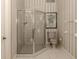 Clean bathroom with a shower and toilet at 441 Tremingham Way, Venice, FL 34293