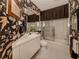 Well-appointed bathroom with a shower and vanity at 441 Tremingham Way, Venice, FL 34293