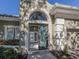 Elegant entryway with a decorative glass door at 441 Tremingham Way, Venice, FL 34293
