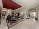 Spacious living room with piano and fireplace at 441 Tremingham Way, Venice, FL 34293