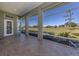 Spacious screened porch overlooking golf course at 441 Tremingham Way, Venice, FL 34293