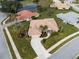 Single-Gathering home with tile roof, pool, and lush landscaping at 5045 Whitestone Dr, Venice, FL 34293