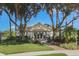 Community building with landscaped grounds and inviting entryway at 5045 Whitestone Dr, Venice, FL 34293