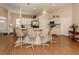 Kitchen features a breakfast bar, stainless steel appliances, and light wood flooring at 5045 Whitestone Dr, Venice, FL 34293