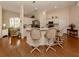 Kitchen with stainless steel appliances and a breakfast bar with seating at 5045 Whitestone Dr, Venice, FL 34293