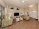 Bright and airy living room with hardwood floors and lots of natural light at 5045 Whitestone Dr, Venice, FL 34293