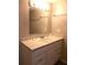 Clean bathroom with vanity, sink and mirror at 516 Ashwood Dr, Venice, FL 34285