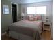 Bedroom with double bed and nightstand at 516 Ashwood Dr, Venice, FL 34285