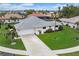 Property view showcasing the house and surrounding neighborhood at 538 Laurel Cherry Ln, Venice, FL 34293