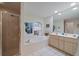 Bathroom with shower, tub, double vanity and tile flooring at 538 Laurel Cherry Ln, Venice, FL 34293