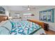 Bright bedroom with queen-size bed and plenty of natural light at 538 Laurel Cherry Ln, Venice, FL 34293