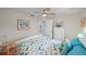 Bright bedroom with a comfortable bed and built-in dresser at 538 Laurel Cherry Ln, Venice, FL 34293