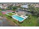 Aerial view of community pool and tennis courts at 538 Laurel Cherry Ln, Venice, FL 34293