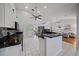 Modern kitchen with stainless steel appliances and granite countertops at 538 Laurel Cherry Ln, Venice, FL 34293