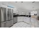 Spacious kitchen with stainless steel appliances and granite countertops at 538 Laurel Cherry Ln, Venice, FL 34293
