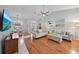 Bright living room with hardwood floors and comfortable sofas at 538 Laurel Cherry Ln, Venice, FL 34293