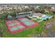 Community tennis courts and pool area at 538 Laurel Cherry Ln, Venice, FL 34293