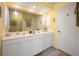 Double vanity bathroom with ample counter space and storage at 5800 Sabal Trace Dr # 701, North Port, FL 34287