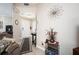 Inviting entryway with tile floors, decorative accents, and coat rack at 5800 Sabal Trace Dr # 701, North Port, FL 34287