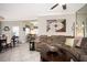 Relaxing living room featuring a sectional sofa and coffee table at 5800 Sabal Trace Dr # 701, North Port, FL 34287