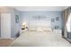 Bright and airy main bedroom with a king-size bed and ample closet space at 5800 Sabal Trace Dr # 701, North Port, FL 34287
