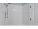 Clean bathroom with shower stall and tiled walls at 640 Back Nine Dr, Venice, FL 34285