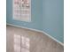 Bright bedroom with tile flooring and window shutters at 640 Back Nine Dr, Venice, FL 34285