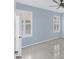 Spacious bedroom with tile floors and ceiling fan at 640 Back Nine Dr, Venice, FL 34285