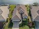 Single-story house with tile roof and well-maintained landscaping at 651 Lakescene Dr, Venice, FL 34293
