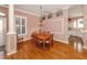 Bright dining room with hardwood floors and chandelier at 651 Lakescene Dr, Venice, FL 34293