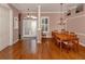 Elegant dining room featuring hardwood floors and a chandelier at 651 Lakescene Dr, Venice, FL 34293
