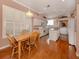 Kitchen with breakfast nook and hardwood floors at 651 Lakescene Dr, Venice, FL 34293