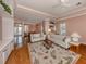 Spacious living room with hardwood floors, and neutral colors at 651 Lakescene Dr, Venice, FL 34293