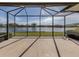 Spacious screened-in patio with lake view at 651 Lakescene Dr, Venice, FL 34293