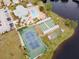 Community amenities include a pool, tennis court, shuffleboard at 664 Linden Dr, Englewood, FL 34223