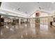 Spacious community room with high ceilings and a fireplace at 664 Linden Dr, Englewood, FL 34223