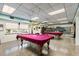 Relax and play in the community game room with pool tables at 664 Linden Dr, Englewood, FL 34223
