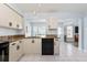 Kitchen with granite counters and black appliances at 664 Linden Dr, Englewood, FL 34223