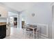 Kitchen features a table for two and views to living room at 664 Linden Dr, Englewood, FL 34223