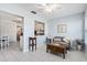 Living room with kitchen and dining area views at 664 Linden Dr, Englewood, FL 34223