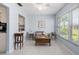Cozy living room with sofa and access to kitchen at 664 Linden Dr, Englewood, FL 34223
