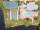 Aerial view of community pool, tennis court, and shuffleboard at 664 Linden Dr, Englewood, FL 34223