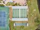 Community shuffleboard courts with covered seating at 664 Linden Dr, Englewood, FL 34223