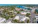 Stunning aerial view of the city featuring beautiful waterways, buildings, and lush greenery at 840 The Esplanade N # 104, Venice, FL 34285