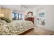 Spacious main bedroom with balcony access, king bed, and beautiful views at 840 The Esplanade N # 104, Venice, FL 34285