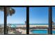 Amazing ocean view from the balcony, featuring a pool and white sand beach at 840 The Esplanade N # 104, Venice, FL 34285