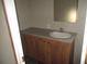 Clean bathroom with a single sink vanity and tub shower at 8426 Sweden Blvd, Punta Gorda, FL 33982
