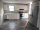 Modern kitchen with stainless steel appliances and white cabinets at 8426 Sweden Blvd, Punta Gorda, FL 33982
